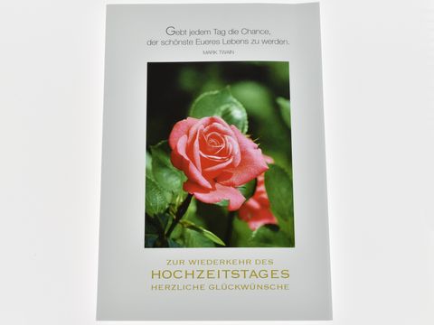 Hochzeitskarte mit einer rosa Rose und dem Schriftzug zur Wiederkehr des Hochzeitstags sowie herzlichen Glückwünschen, Hersteller Juwelier Harnisch.