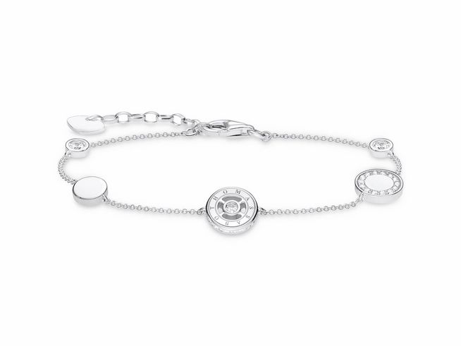 Silbernes Armband von Thomas Sabo mit Zirkonia in weiß, verziert mit verschiedenen Elementen, einstellbare Länge von 16 bis 19 cm. Elegantes Design für stilvolle Akzente.