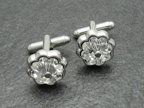 Manschettenknöpfe in silber-farben mit Strass Blüte, Hersteller Juwelier Harnisch, besetzt mit funkelnden Strass Steinen, elegant und stilvoll für besondere Anlässe.