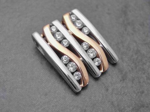 Designerwellen Anhänger aus Sterling Silber in bicolor mit Rosévergoldung und rhodinierten Elementen, verziert mit Zirkonia, Hersteller Juwelier Harnisch.