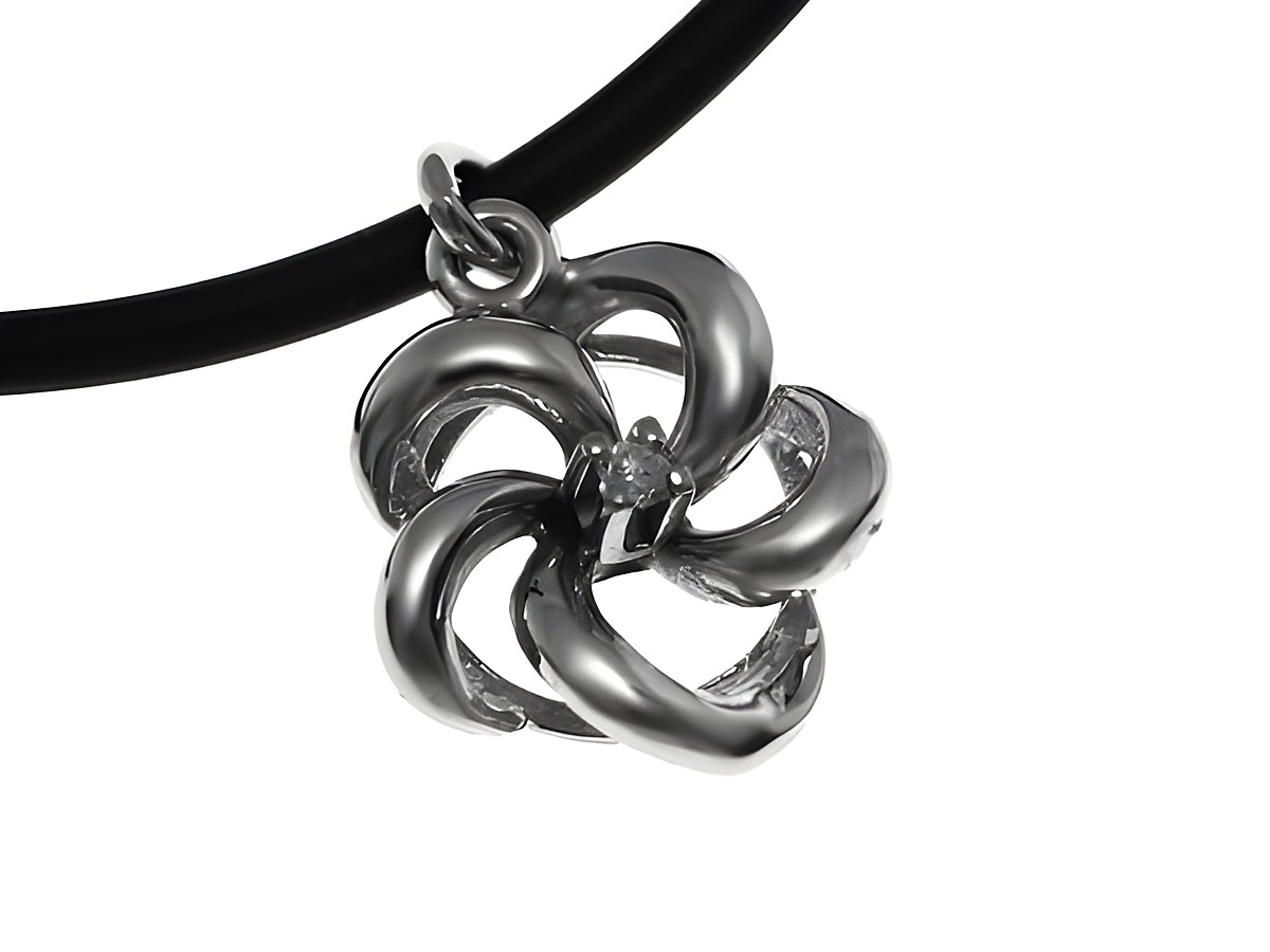 Blume aus Weißgold mit goldenen Anhängern, gefertigt aus Gold 585, verziert mit Diamanten, Hersteller Juwelier Harnisch, elegant und stilvoll für jedes Outfit.