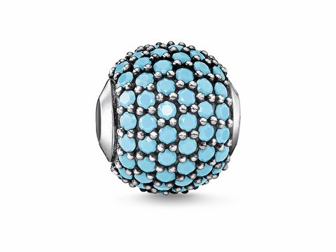 Eleganter Thomas Sabo Karma Bead K0289-667-17 aus Silber, besetzt mit funkelndem Pavé in Türkis, ideal für individuelle Schmuckkreationen.