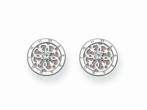 Ohrstecker von Thomas Sabo aus 925 Sterling Silber in Blütenform mit weißem Zirkonia, verziert mit filigranen Mustern und eingraviertem Markennamen.