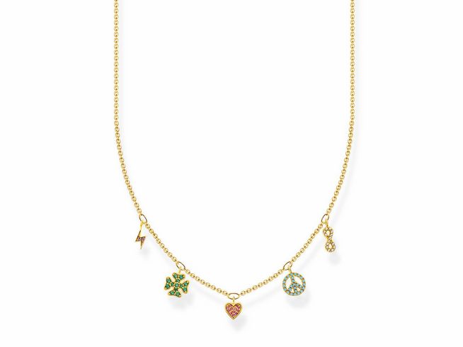 Eine Thomas Sabo Kette aus vergoldetem Sterling Silber mit bunten Anhängern in Form eines Blitzes, Kleeblattes, Herzens, Friedens_symbols und einem Schlüssel, ausgestattet mit synthetischem Korund und Zirkonia.