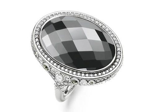 41606329-0 Thomas Sabo Ring aus Sterling Silber mit ovalem, facettiertem, grauem Hämatit und Zirkonia-Steinen in Größe 52, elegantes Design mit glitzerndem Rand.