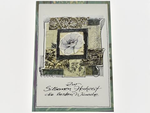 Hochzeitskarte mit einer Blüte und silbernen Ornamenten, dekorativ gestaltet, passend zur silbernen Hochzeit, hergestellt von Juwelier Harnisch für besondere Glückwünsche.