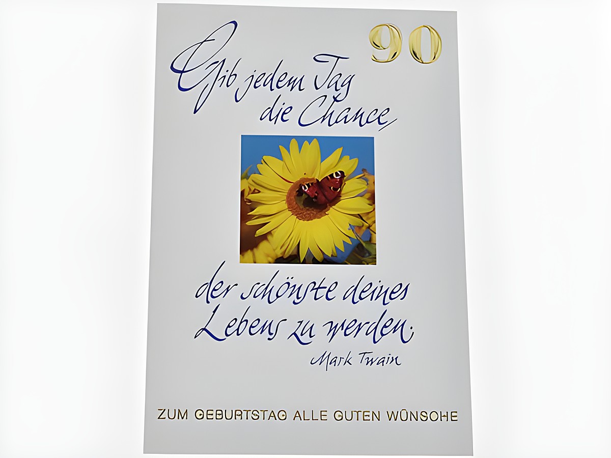 Geburtstagskarte mit einer strahlenden Sonnenblume und einem Schmetterling in der Mitte. Der Text zitiert Mark Twain und bietet gute Wünsche zum Geburtstag. Hersteller: Juwelier Harnisch.