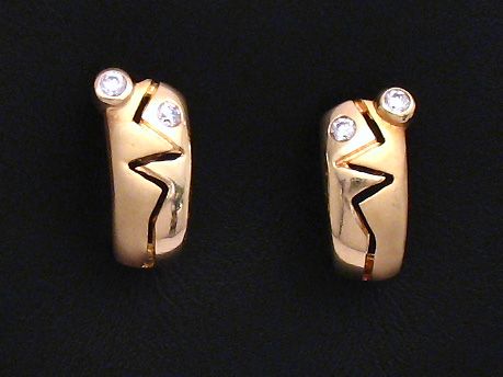Gold Ohrringe kunstvoll aus Gold 585 mit Zirkonia des Herstellers Juwelier Harnisch, elegant gestaltet und funkelnd, ideal für besondere Anlässe.