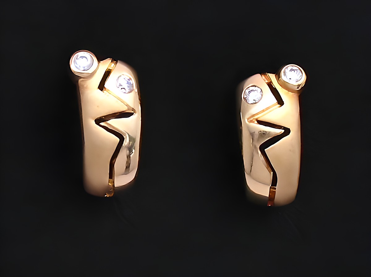 Gold Ohrringe kunstvoll aus Gold 585 mit Zirkonia des Herstellers Juwelier Harnisch, elegant gestaltet und funkelnd, ideal für besondere Anlässe.