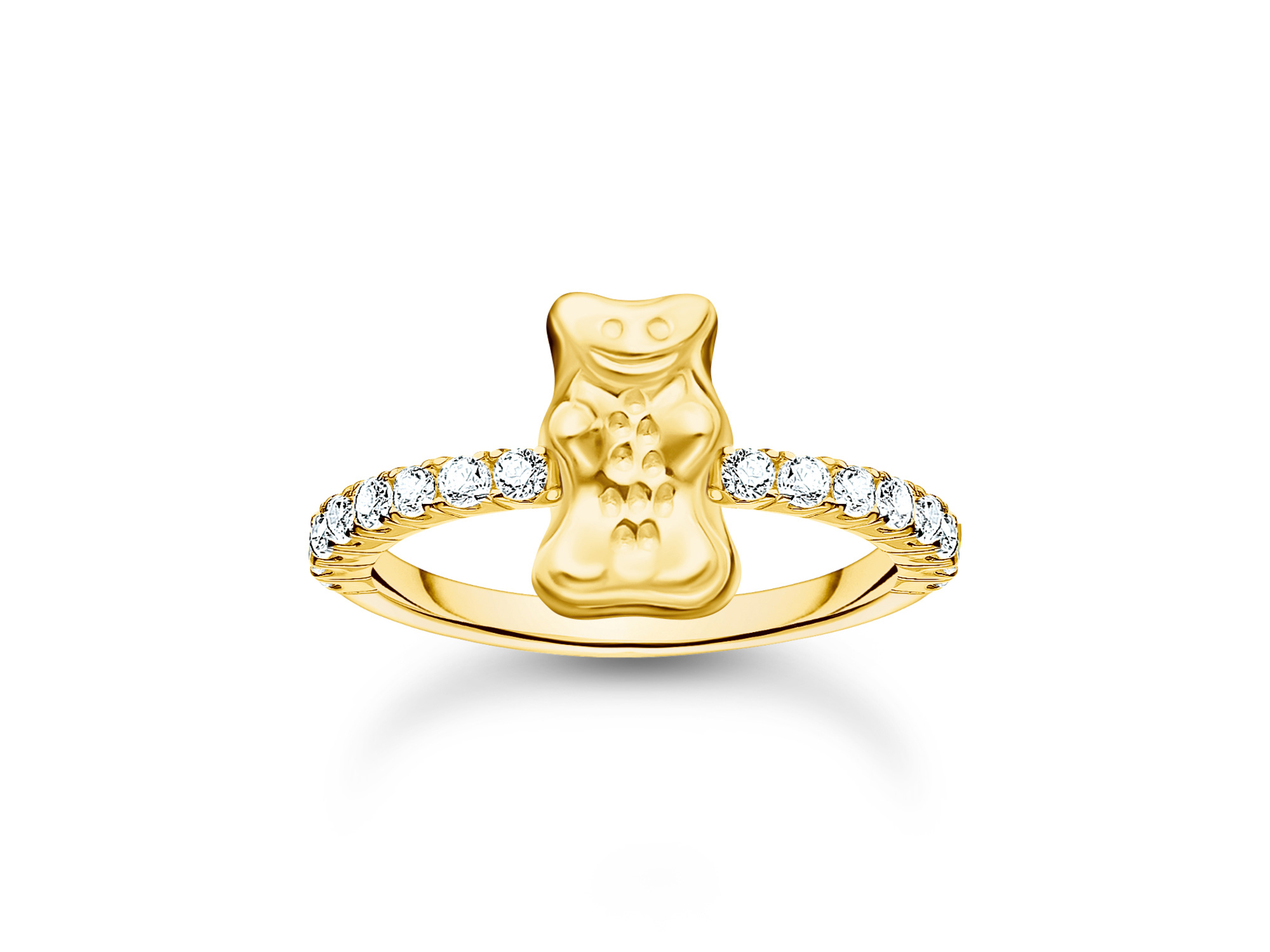 Thomas Sabo Ring TR2504-414-14-60 - Goldbär Gummibärchen - HARIBO - Gr. 60 - Silber vergoldet Thomas Sabo Ring TR2504-414-14-50 mit einem goldfarbenen Gummibärchen-Design und funkelnden Zirkonia-Steinen an der Ringschiene, gefertigt aus silbervergoldetem Material, Größe 50.