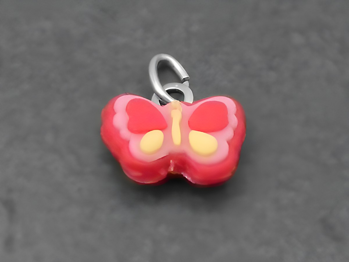 Schmetterling Kautschuk Silber Anhänger tierisch für Kinder, pinker und gelber Schmetterling, ideal als Schmuckstück für jungen und kreativen Stil. Hersteller Juwelier Harnisch.