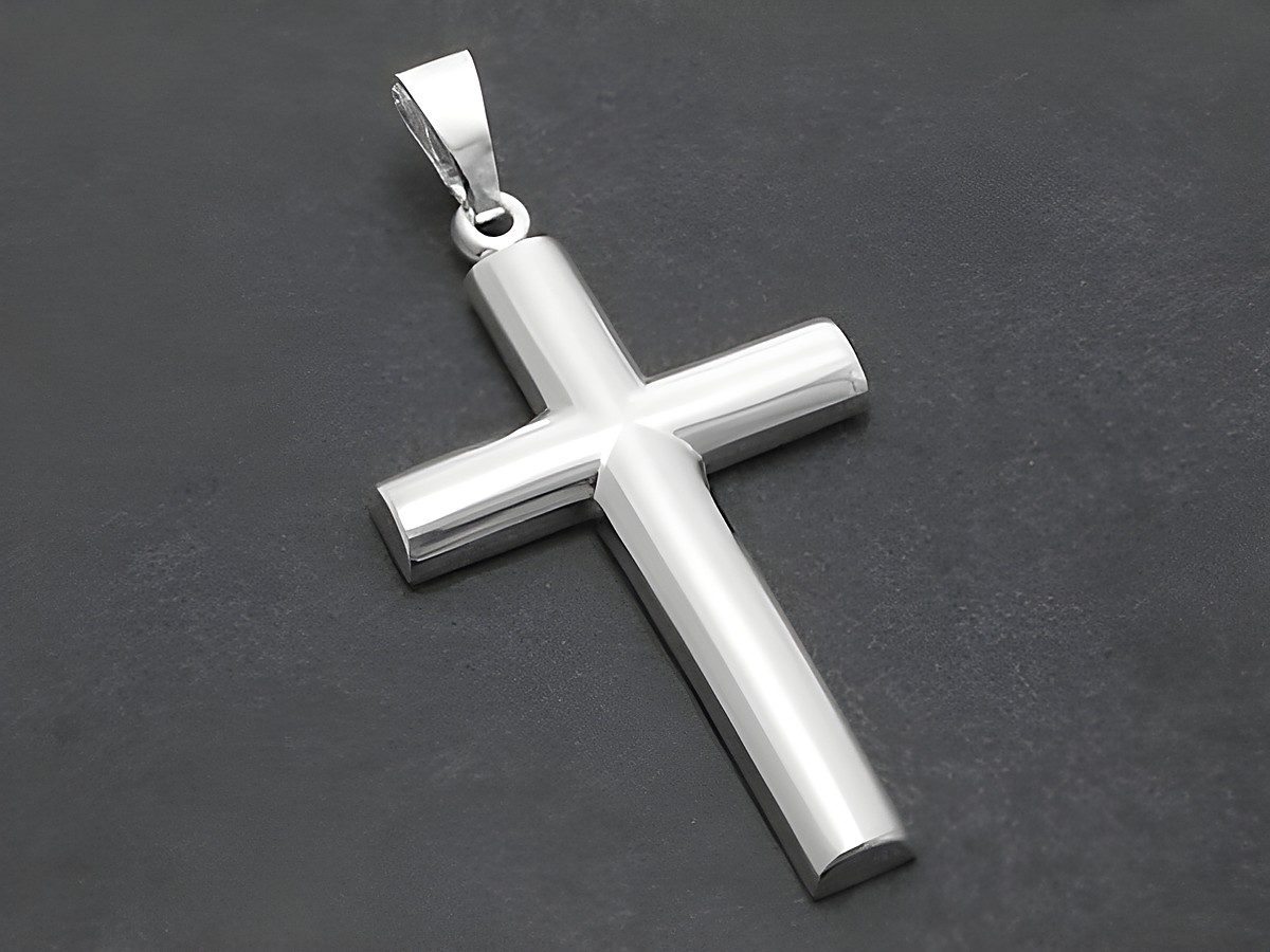 Kreuz Anhänger aus Sterling Silber, poliert und elegant, hergestellt von Juwelier Harnisch, schlicht und zeitlos in der Form. Ideal als modisches Accessoire oder als Geschenk.