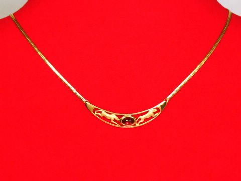 Collier Goldkette 333 mit Mittelteil im Leopardenmuster und Granat, 45cm lang, hochwertig verarbeitet, Hersteller Juwelier Harnisch, elegantes und auffälliges Schmuckstück.