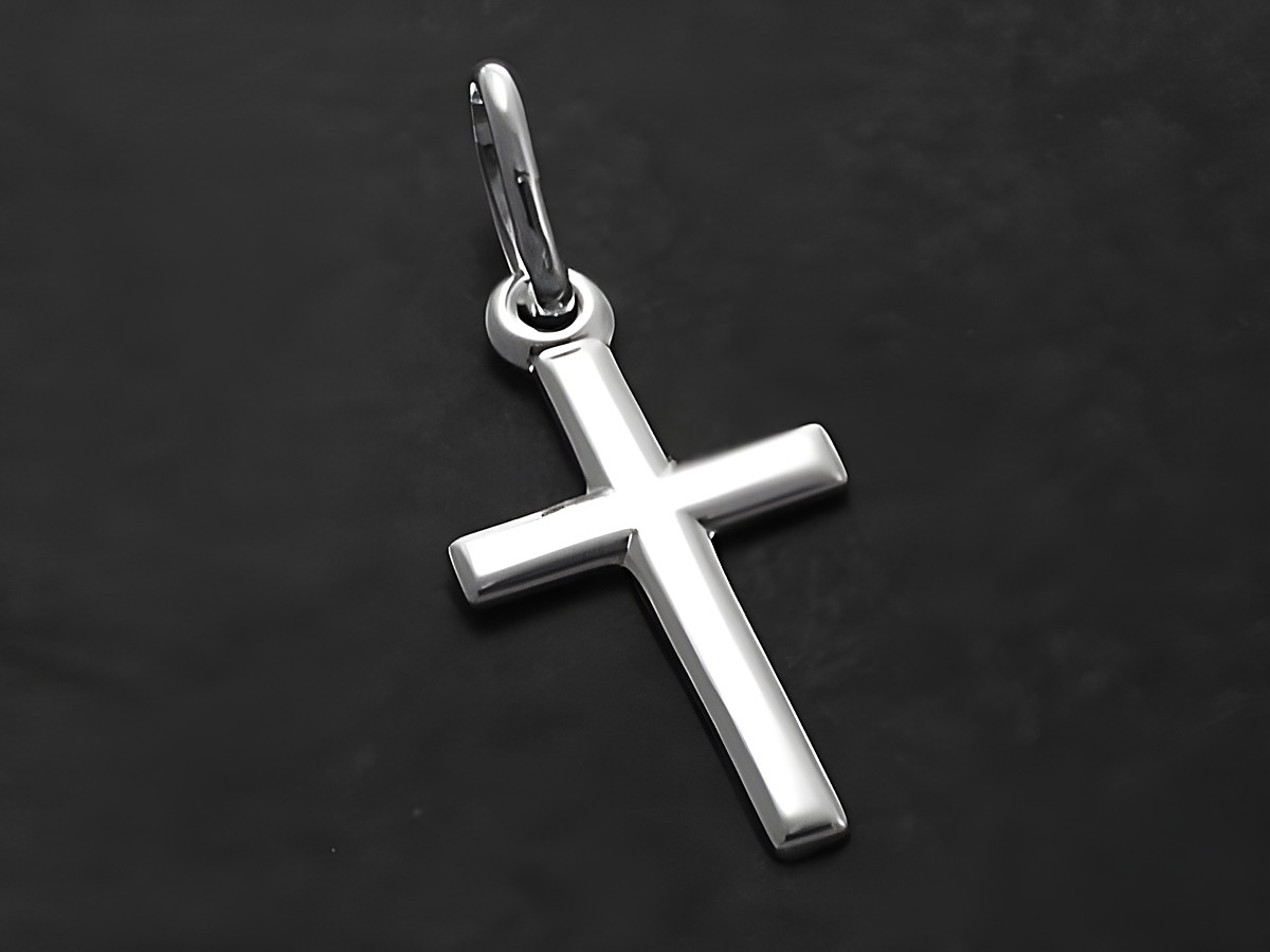 Kreuz Anhänger aus Sterling Silber, schlicht und elegant, hergestellt von Juwelier Harnisch, ideal als dezentes Schmuckstück.