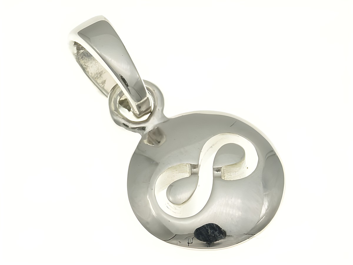 Rund- unendlichkeit Anhänger aus rhodiniertem Sterling Silber mit einem filigranen Unendlichkeitssymbol auf einer glänzenden Oberfläche, hergestellt von Juwelier Harnisch.
