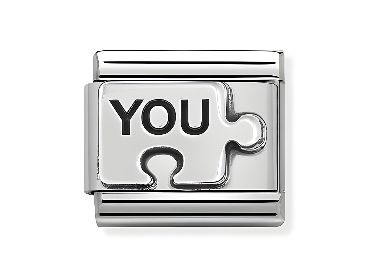 Edelstahl Charm mit oxidierten Symbolen, zeigt das Wort YOU in einer Puzzlestück-Form, designed von Nomination, eignet sich für klassische Armbänder, silberfarbig.