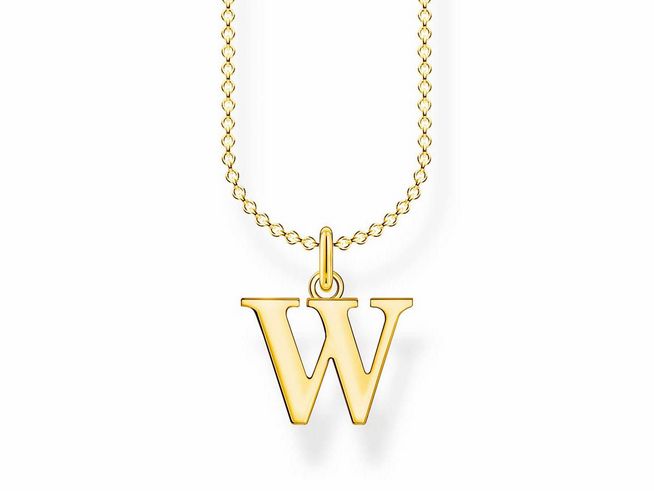 Eine vergoldete Silberkette von Thomas Sabo mit dem Buchstabenanhänger W in elegantem Design, verstellbar von 38 bis 45 cm, ideal für personalisierte Schmuckliebhaber.