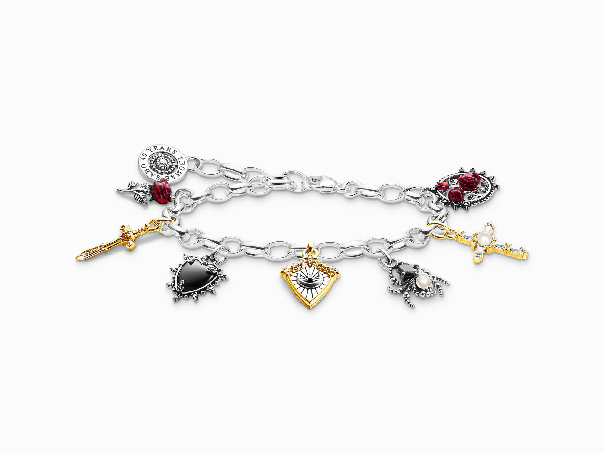 Buntes Thomas Sabo Armband aus Silber mit Süßwasserzuchtperle und Zirkonia, verziert mit verschiedenen charmannten Anhängern, Länge 19 cm.