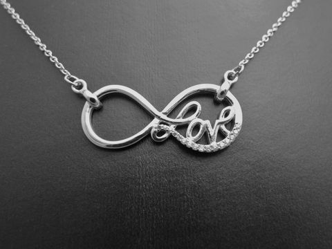 Silber Collier - Unendliche Liebe rhodiniert mit Zirkonia, 42-45,5 cm, Hersteller: Juwelier Harnisch, inkl. Kette, filigranes Design in Form des Unendlichkeitssymbols mit dem Wort Love.