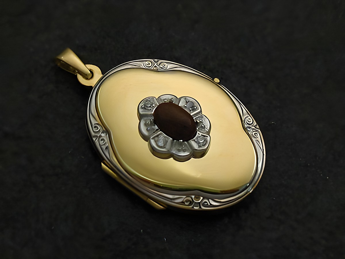 Mahagoni Obsidian Medaillon Cabochon in Gold 585 bicolor mit Brillanten, gefertigt von Juwelier Harnisch, elegantes Design und hochwertige Materialien unterstreichen die Schönheit dieses Schmucks.