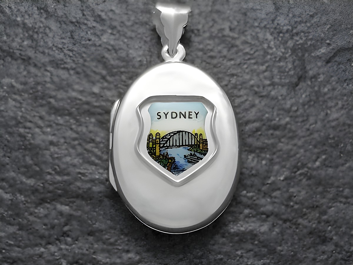 Silbermedaillon mit dem Wappen von Australien und der Sydney Harbour Bridge, Hersteller Juwelier Harnisch, verziert mit bunten Details, ideal für Sammler und Liebhaber.