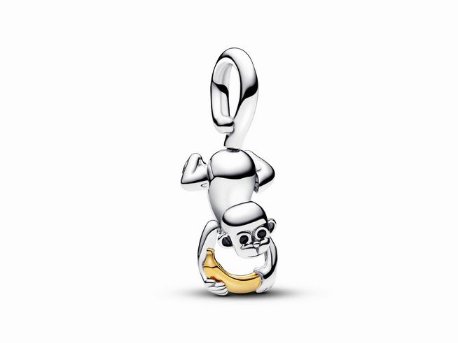 Beweglicher Affen Charm-Anhänger von Pandora aus Sterling Silber und vergoldetem Gelbgold mit einem Steinmix in Schwarz, der verspielt eine Banane hält.