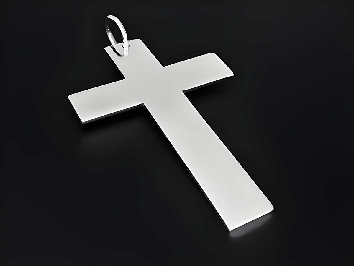 Silberner Kreuzanhänger, schlichtes Design, religiöses Symbol für Jesus, geeignet für Kirche und Alltag. Hersteller: Juwelier Harnisch.