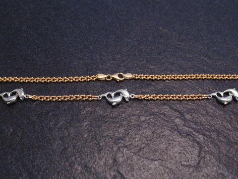 Kette Delfin-Pärchen aus Gold 585 in bicolor Optik, Länge 42,5 cm, Hersteller Juwelier Harnisch, edles Design mit herzförmigen Delfinen, ideal als zeitloses Schmuckstück.