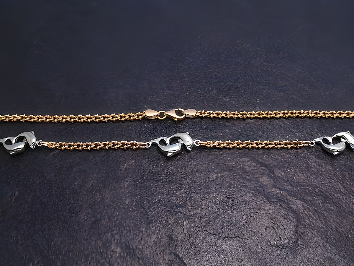 Kette Delfin-Pärchen aus Gold 585 in bicolor Optik, Länge 42,5 cm, Hersteller Juwelier Harnisch, edles Design mit herzförmigen Delfinen, ideal als zeitloses Schmuckstück.