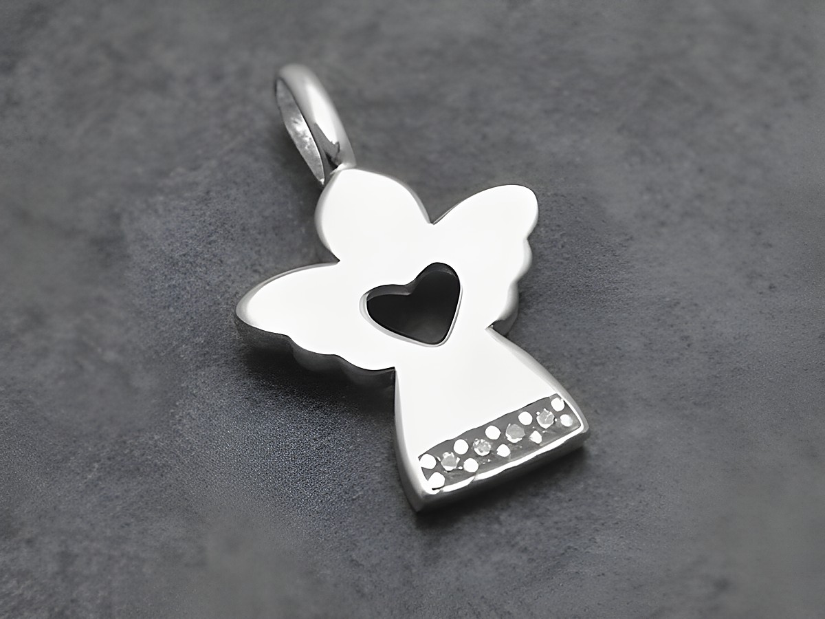 Silber Anhänger - Engel mit Herz - Zirkonia - weiss - entzückend, Hersteller: Juwelier Harnisch, Engel. Der Anhänger zeigt einen stilisierten Engel mit einem Herz und glitzernden Zirkonia.