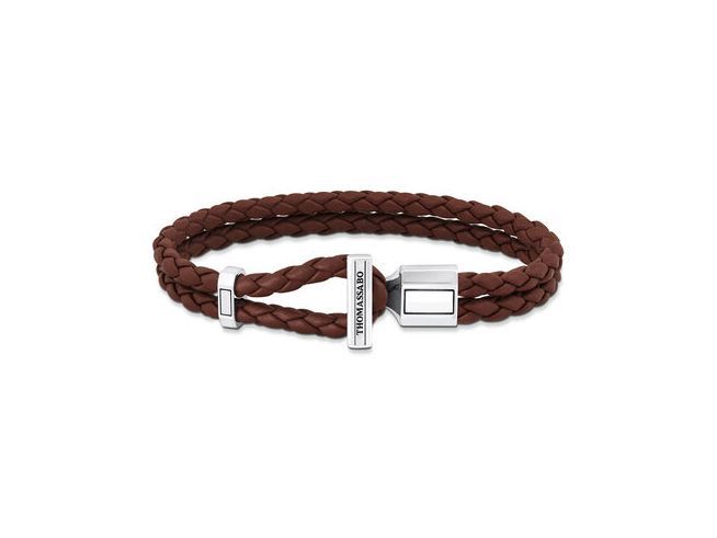 Lederarmband von Thomas Sabo in braun mit geflochtenem Design und silberner Verschlussöse, 17 cm lang, verbindet stilvolle Eleganz mit modernem Charme.