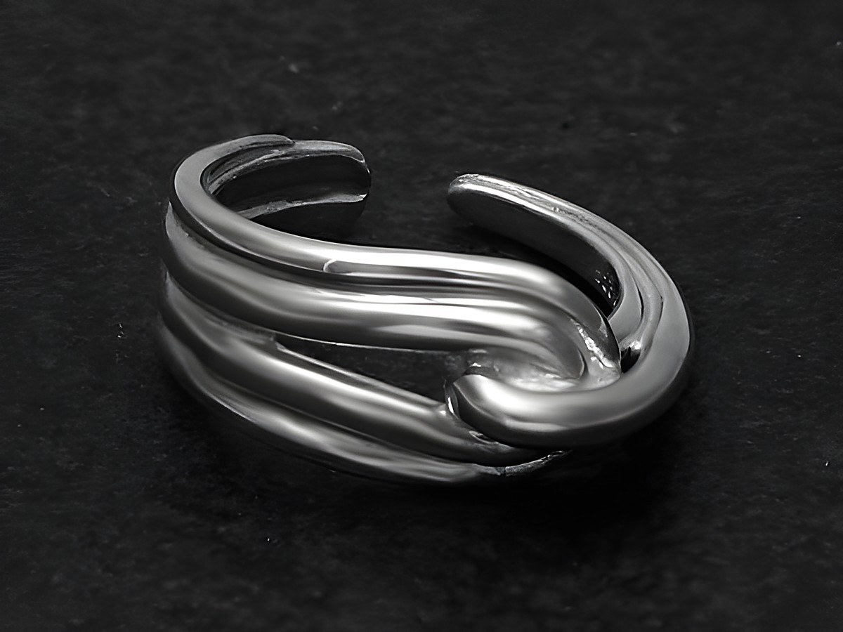 Silberring aus rhodiniertem Metall, kunstvoll gestaltet mit wenigen verstellbaren Elementen, hergestellt von Juwelier Harnisch, ohne Stein.