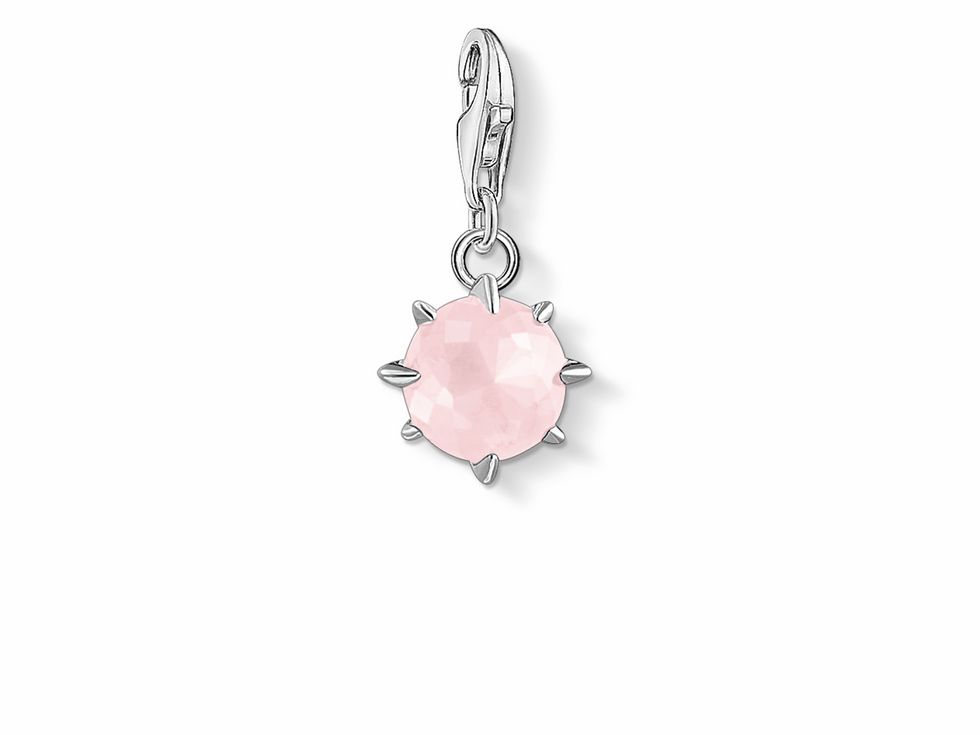 Thomas Sabo Charm-Anhänger in Silber mit rosa Monatsstein für Oktober, facettierter rose Quarz, stilvolles Design mit spitzen, ideal für persönliche Schmuckstücke.