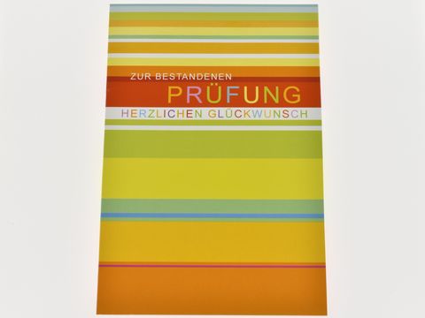 Bunte Glückwunschkarte von Juwelier Harnisch, mit gestreiftem Design und dem Aufdruck Zur bestandenen Prüfung Herzlichen Glückwunsch. Ideal zum Gratulieren.