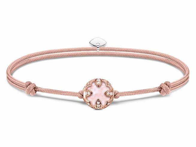 Silbernes Armband von Thomas Sabo mit vergoldetem Roségold und Nylon, verziert mit einem Rosenquarz-Karma Bead, elegant und modern im Design, ideal für jeden Anlass.