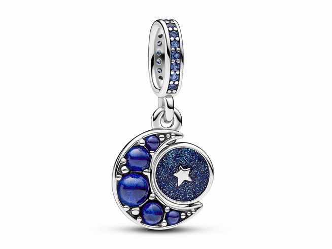Funkelnder drehender Mond Charm-Anhänger von Pandora aus Sterling Silber mit blauen Kristallen und einem runden blauen Element mit Stern. Ideal für Schmuckliebhaber.