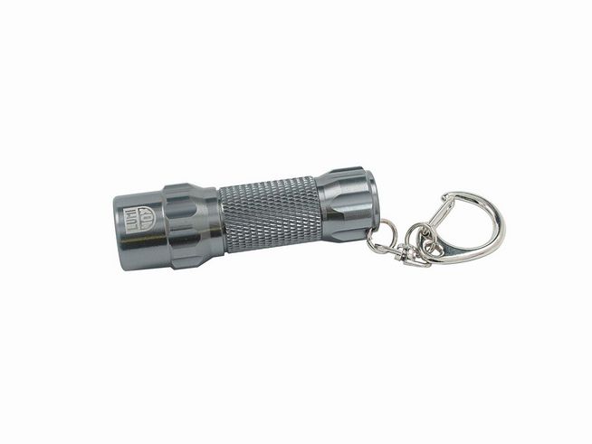 Luminox Mini-Taschenlampe JAC.L003 in grau mit strukturiertem Griff und Schlüsselanhänger, ideal für Taschen oder Schlüsselbunde, kompakt und praktisch für unterwegs.
