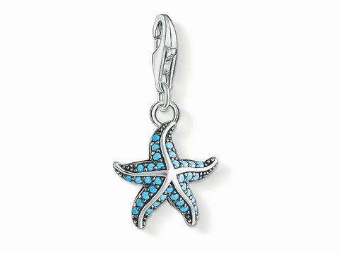 Charm-Anhänger in Form eines Seesterns von Thomas Sabo, Modellnummer 1521-667-17, aus Silber mit türkisfarbenen Akzenten, ideal für eine tierische Schmuckkollektion.