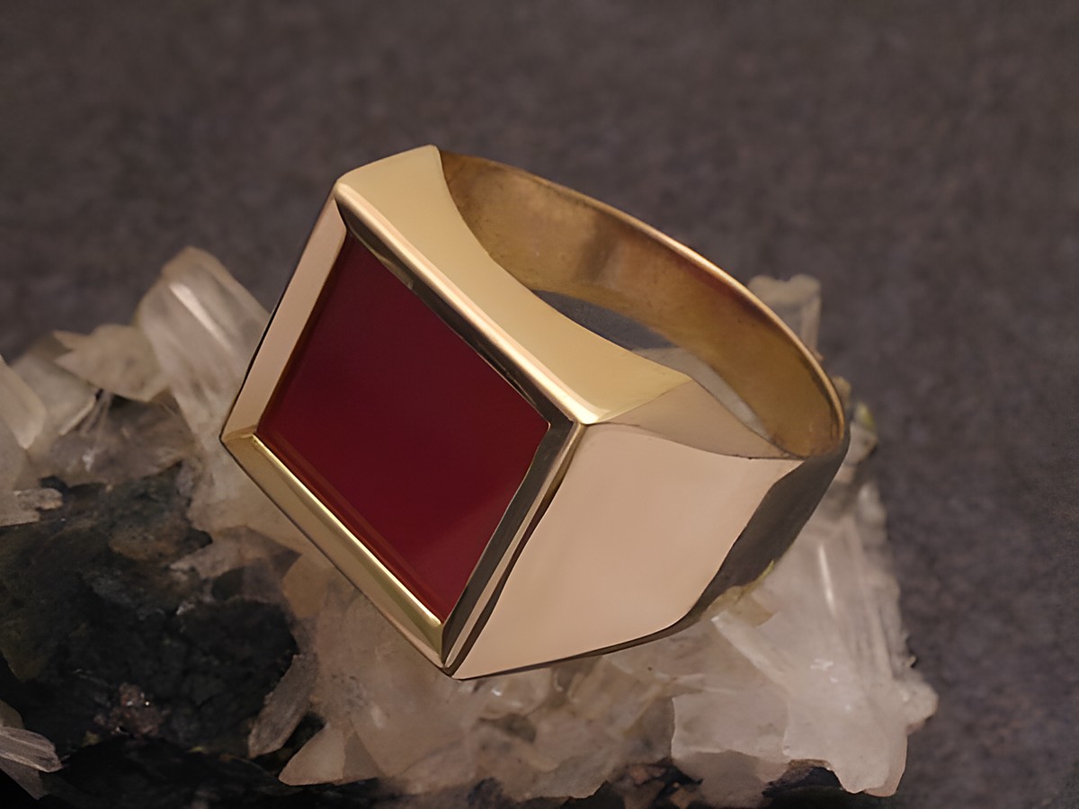 Modernes Goldring aus Gold 333 mit Karneol in Größe 61,5, Hersteller Juwelier Harnisch, über Größe 60/19, stilvolles Design auf Mineralien präsentiert.