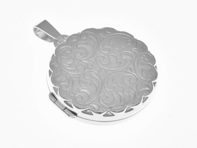 Medaillon rund mit Diamantschliff aus Sterling Silber, rhodiniert und verschlungen, Hersteller Juwelier Harnisch, verziert mit einem eleganten, gravierten Muster.