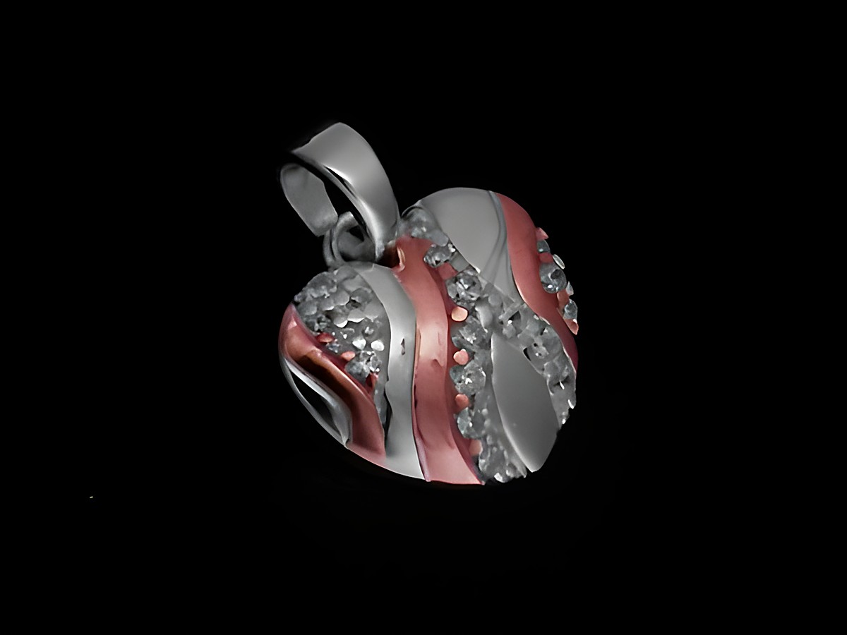 Herz Anhänger aus 925 Sterling Silber, romantisch gestaltet mit Zirkonia, rosé vergoldet, Hersteller Juwelier Harnisch, ideal für besondere Anlässe.