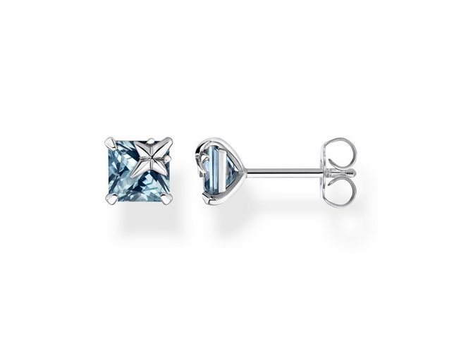 Thomas Sabo Ohrstecker H2116-638-1 aus Sterling Silber mit geschwungenem Design und synthetischem blauen Spinell, funkelnd und elegant, perfekt für jeden Anlass.