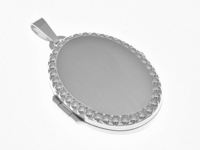 Medaillon Oval Sterling Silber rhodiniert teilmattiert elegant von Juwelier Harnisch, zeitloses Design mit feiner Verzierung und praktischem Verschluss, ideal für persönliche Erinnerungen.