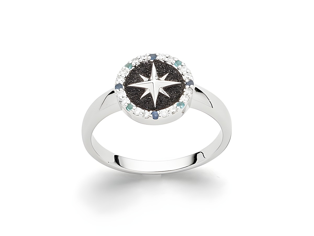 Silberner Ring von DUR mit rhodiniertem Finish, verziert mit schwarzem Lavasand und funkelnden Zirkoniasteinen, in Größe 52, mit einem eleganten Kompassrosen-Motiv.