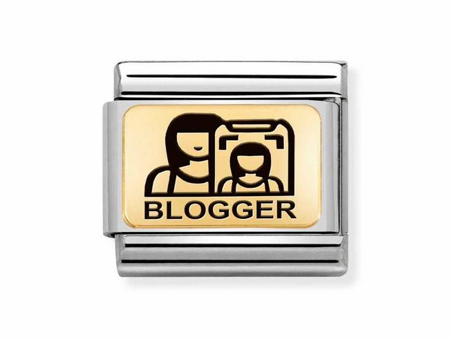 Edelstahl und Gold Charm von Nomination mit emailliertem Blogger-Motiv und der Aufschrift Blogger. Ein stilvolles Accessoire für kreative Köpfe. Ideal für den modischen Ausdruck.