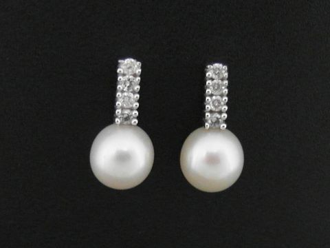 Glamouröse Ohrstecker aus Weißgold 585 mit Diamanten und Zuchtperlen, hergestellt von Juwelier Harnisch, elegant und funkelnd, ideal für besondere Anlässe.