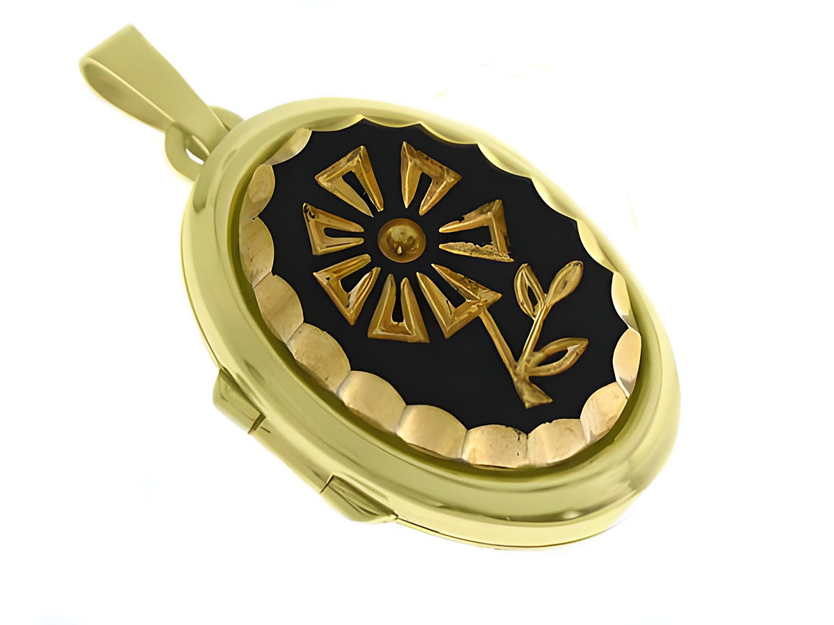 Flower Medaillon mit Cabochon in Gold 585, elegant verarbeitet von Juwelier Harnisch, zeigt ein florales Design auf schwarzem Hintergrund, verziert mit einem goldenen Blütenmotiv.