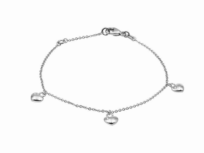 Armband Herzreihe aus rhodiniertem Silber mit drei kleinen Herzen, in zwei Längen von 14,5 cm und 17 cm, verziert mit Zirkonia, Hersteller Juwelier Harnisch.