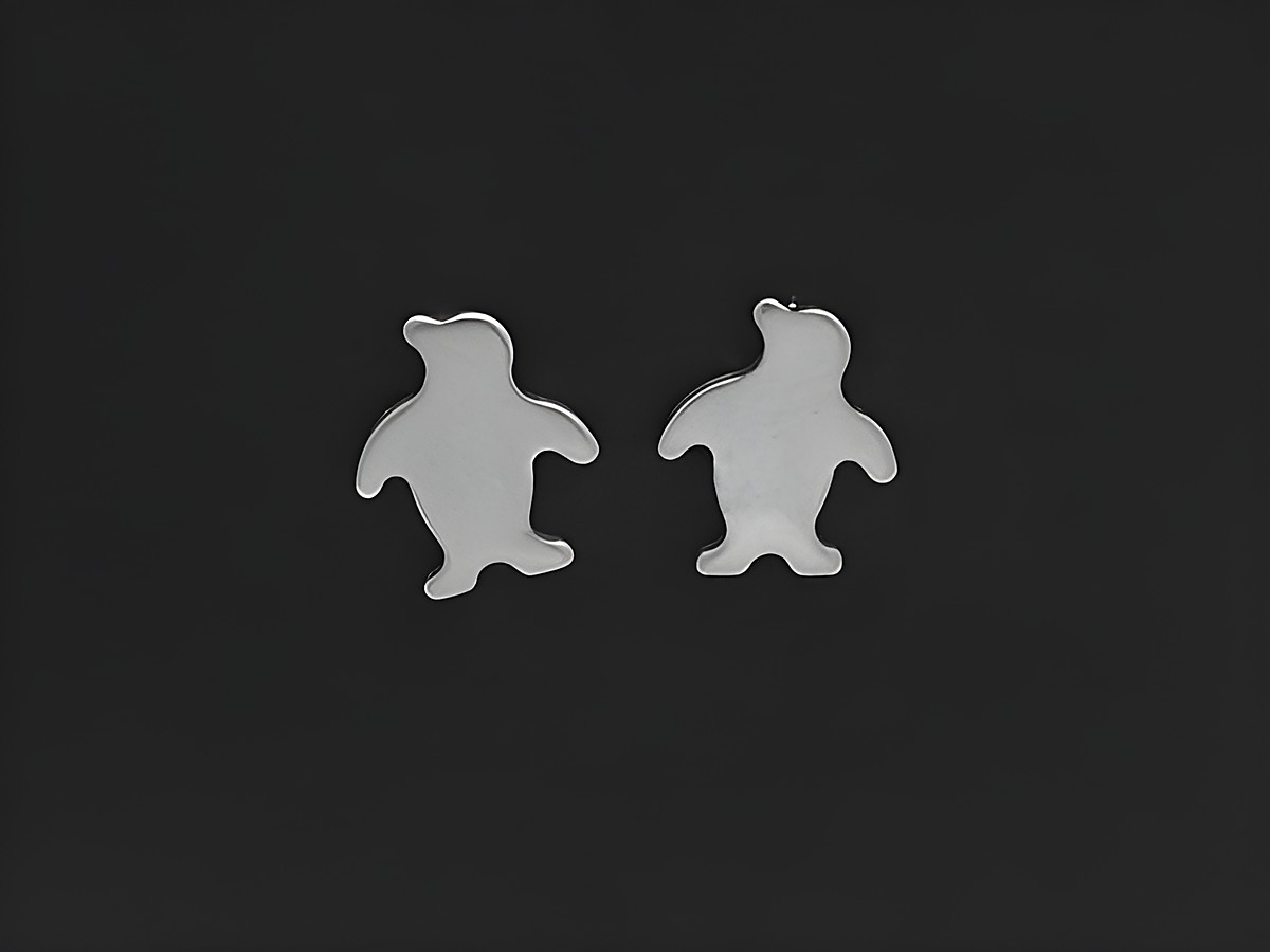 Edelstahl Ohrstecker in Form von Pinguinen, Hersteller Juwelier Harnisch, glänzendes Silber-Design, ideal als modisches Accessoire für Tierliebhaber.