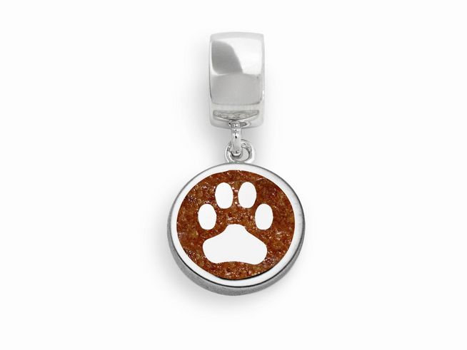 Sterling Silber Anhänger Charm Lucky Dog von DUR mit einem runden, bernsteinfarbenen Hintergrund und einem weißen Pfotenabdruck. Elegant und stilvoll, ideal für Tierliebhaber.